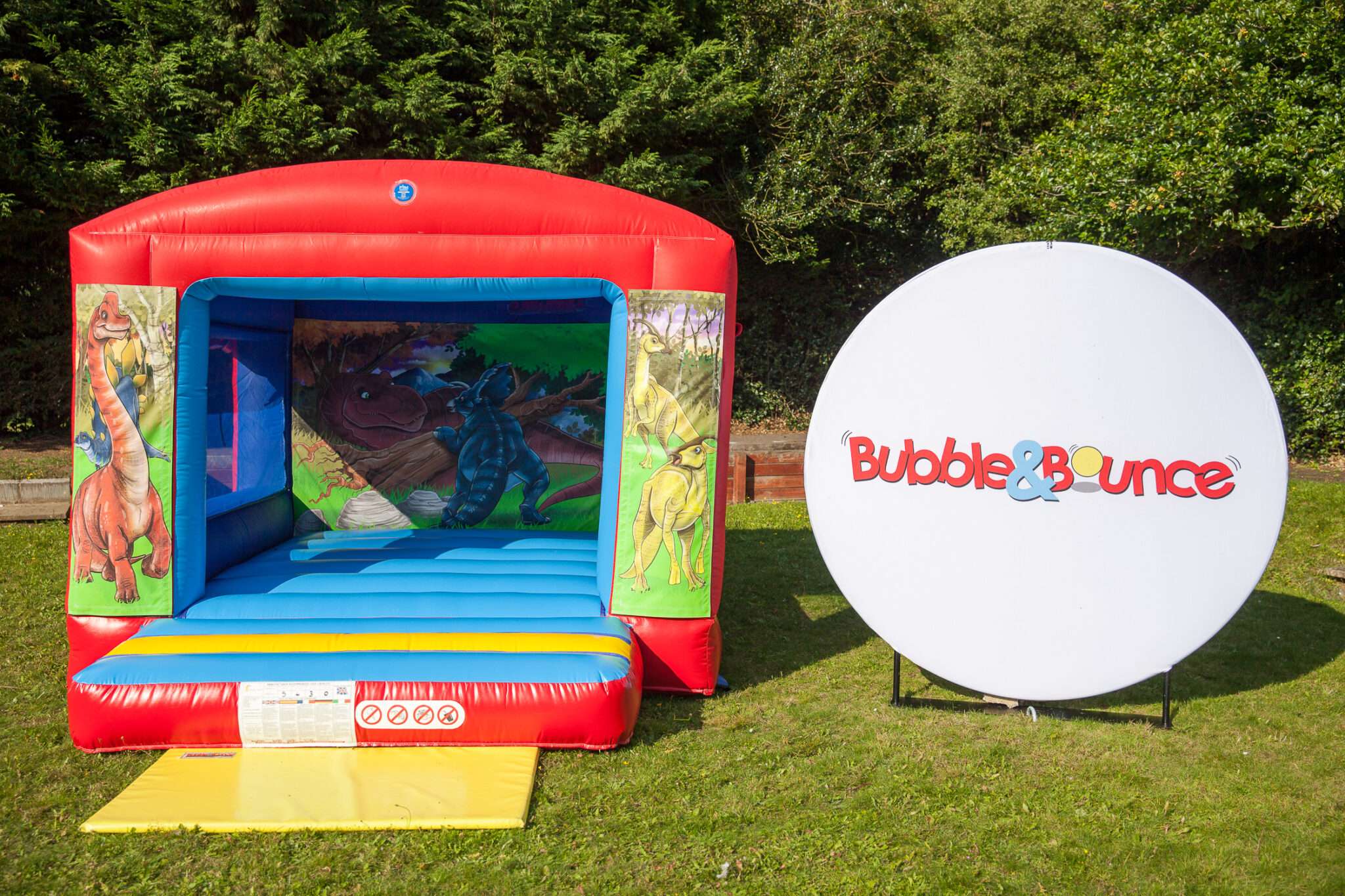 Dinosaur Bouncy Castle Hire London 10x13ft, a bouncy castle for hire from Bubble & Bounce